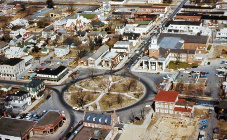 Few people realize that a car dealership, bottom left, operated on The Circle for many years. Eighteen years after this photograph was taken in 1988, the site became the home of Family Court. DELAWARE PUBLIC ARCHIVES PHOTO